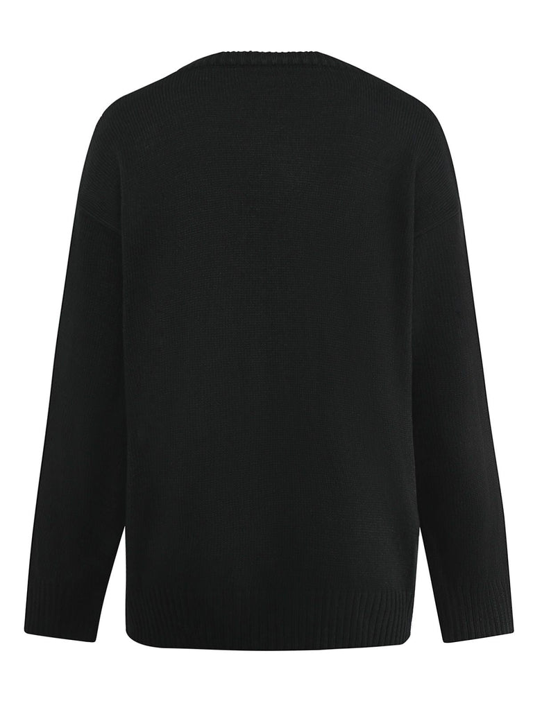 Pull en tricot noire à squelette Halloween années 1950