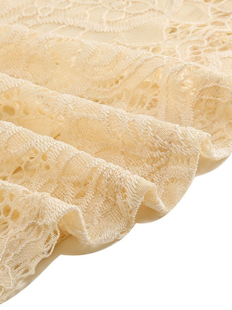 Robe en dentelle unie à col en V et sans manches années 1950