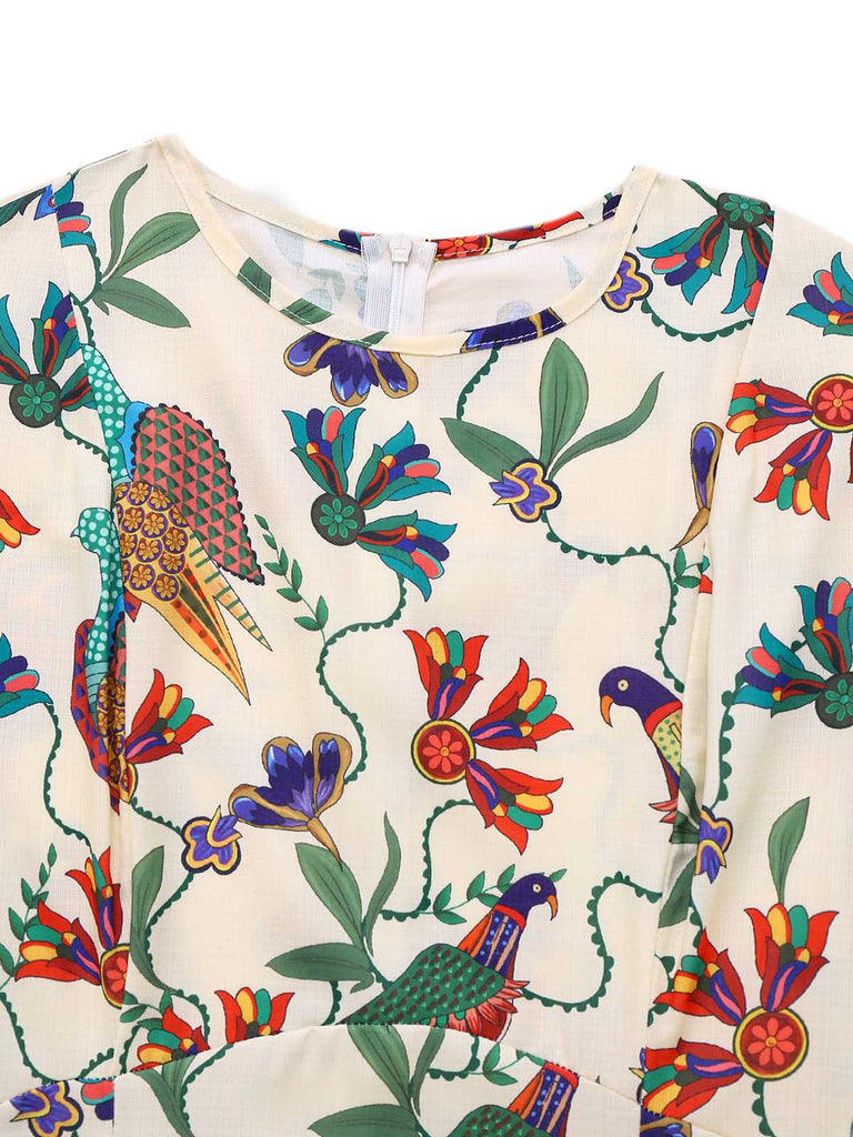 Robe beige fleurs et oiseaux à manches bouffantes années 1940