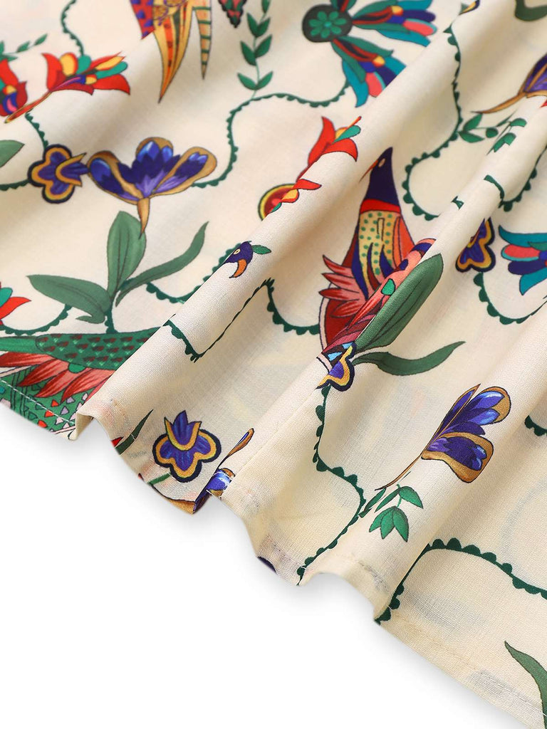 Robe beige fleurs et oiseaux à manches bouffantes années 1940