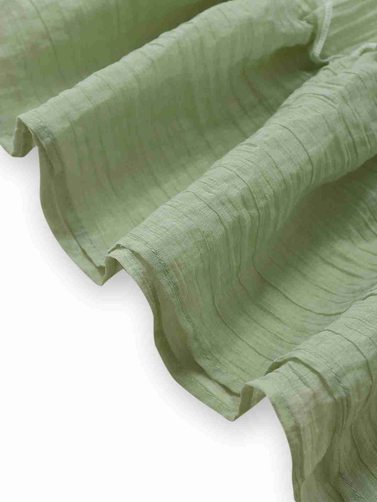 Robe verte à bretelles spaghetti et nœud papillon années 1940