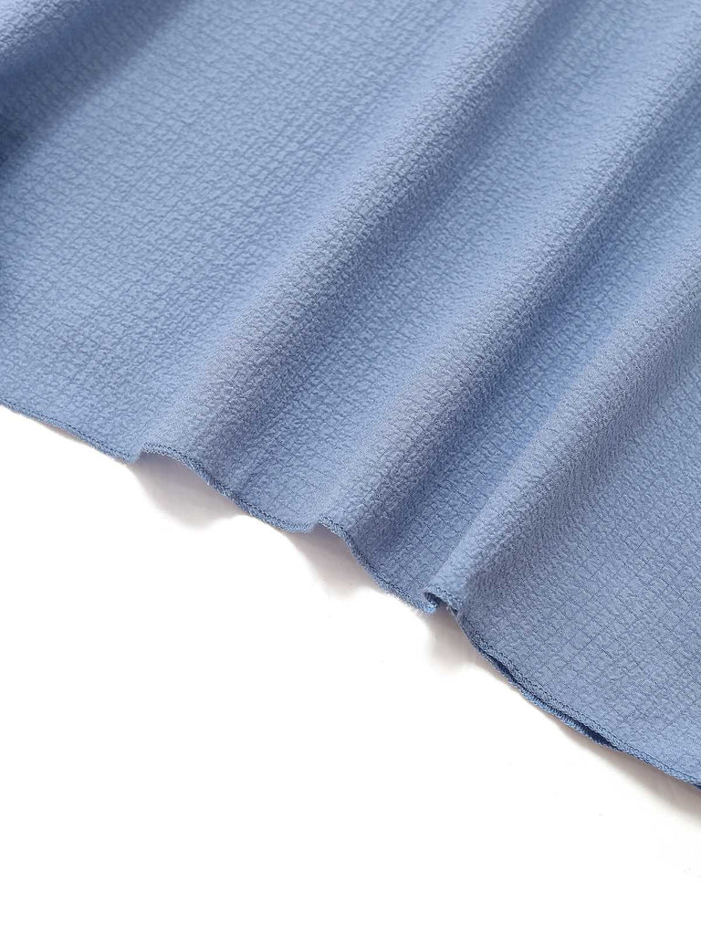 Robe manches volants froncée fendue col V uni des années 1940