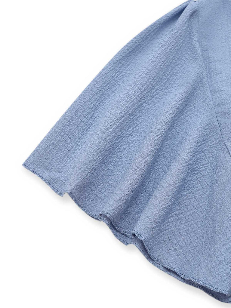 Robe manches volants froncée fendue col V uni des années 1940