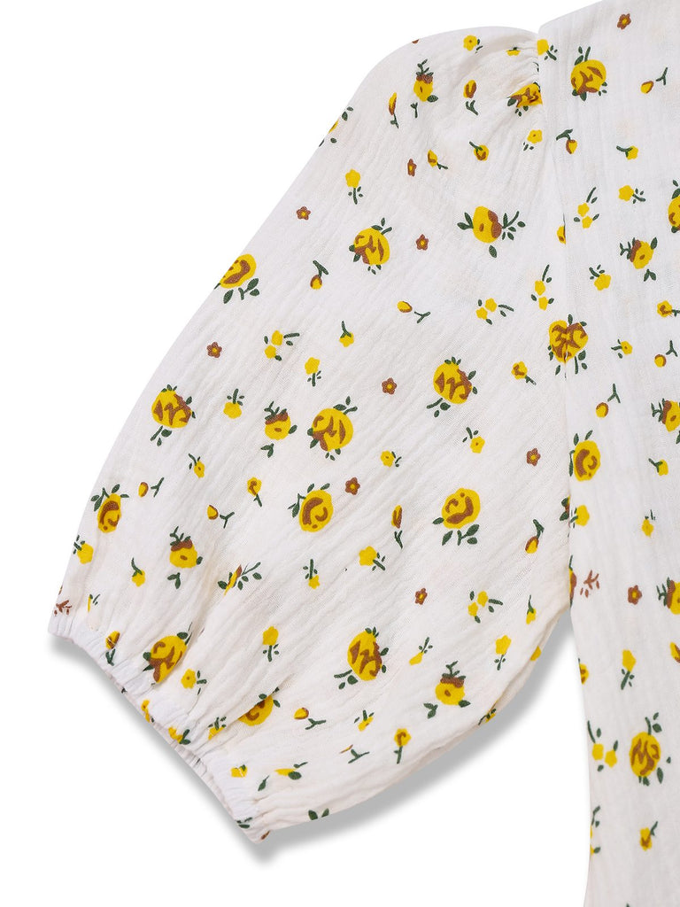 Robe blanche à petites fleurs en coton années 1940