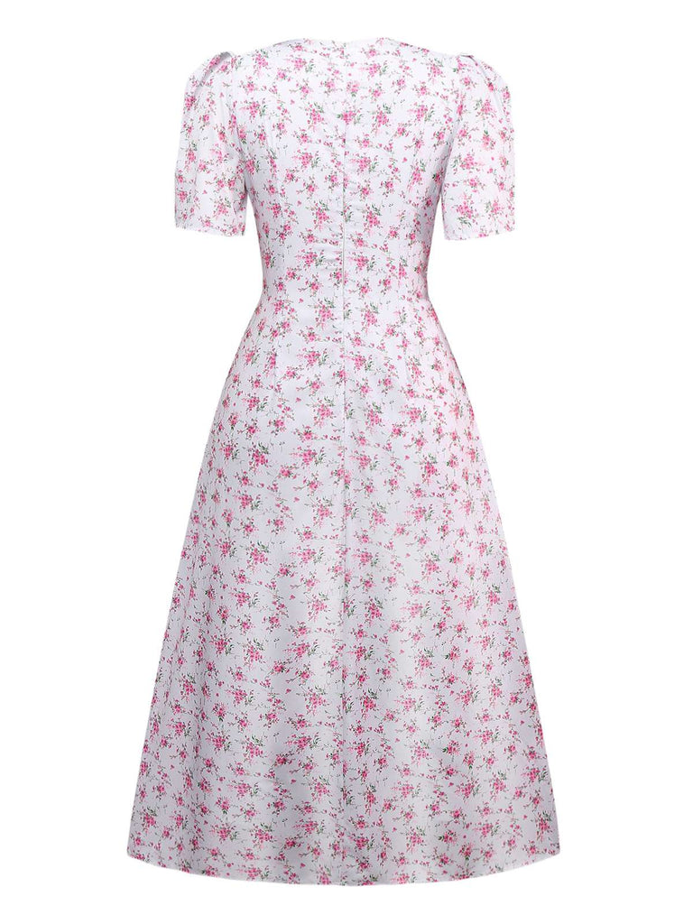 Robe lavande col V manches bouffantes à petites fleurs des années 1940
