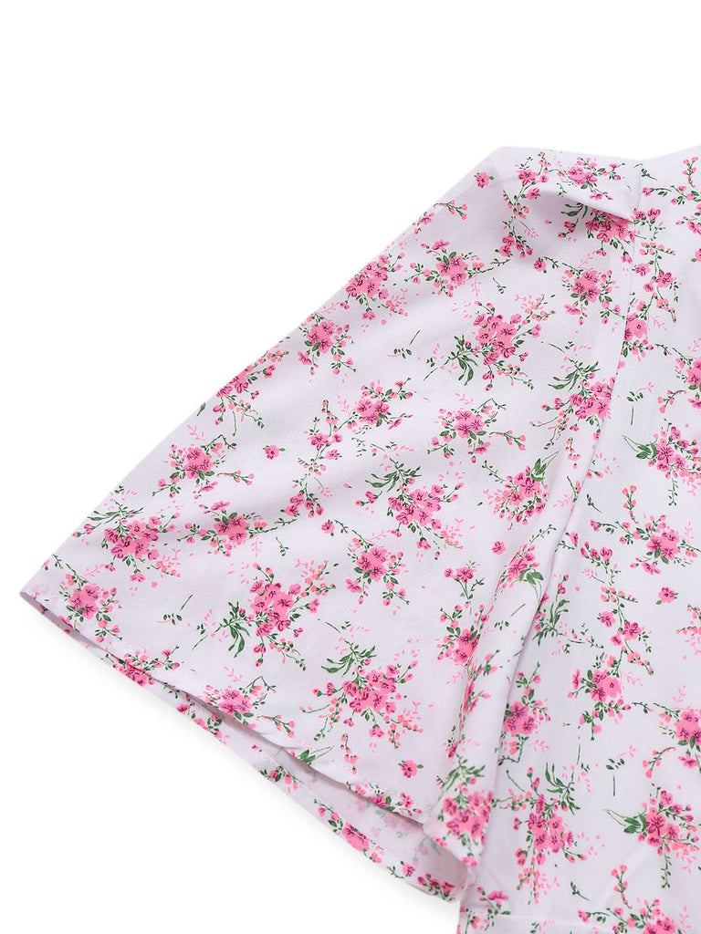 Robe lavande col V manches bouffantes à petites fleurs des années 1940