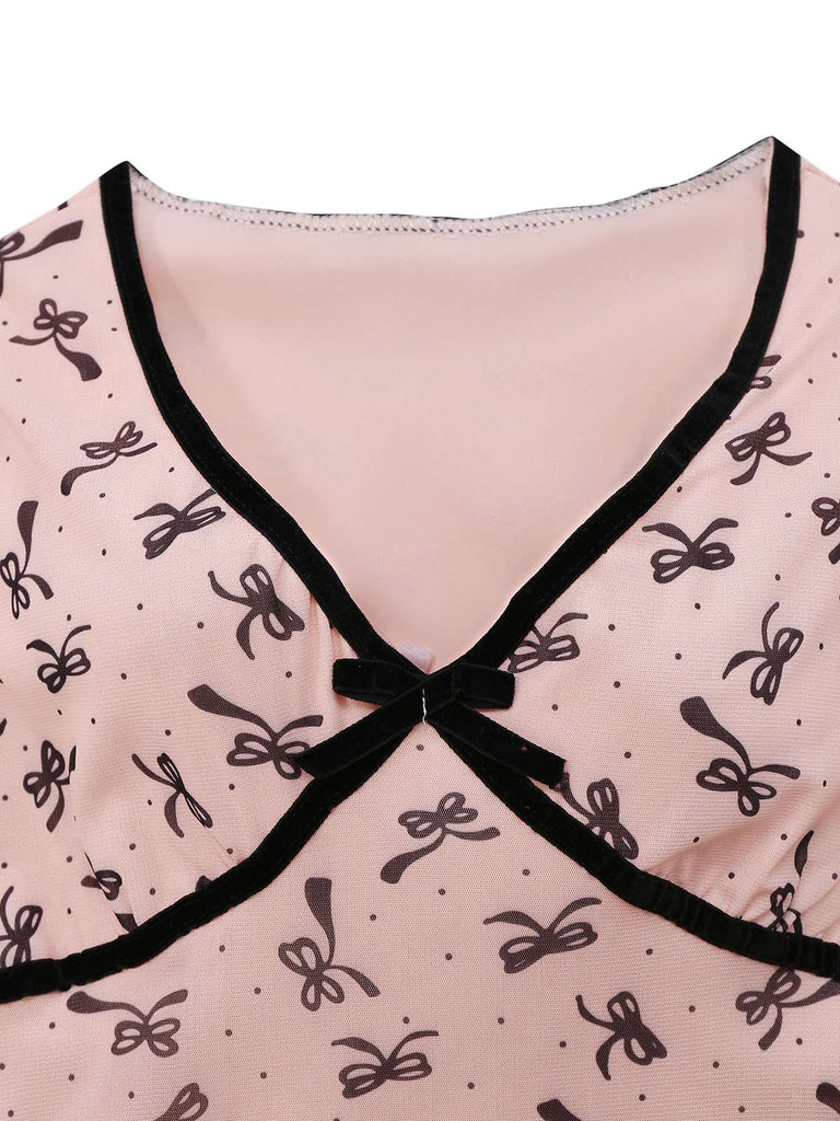 Robe rose en maille col V imprimé nœuds des années 1960