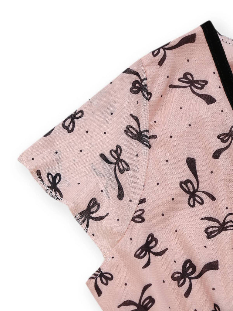 Robe rose en maille col V imprimé nœuds des années 1960