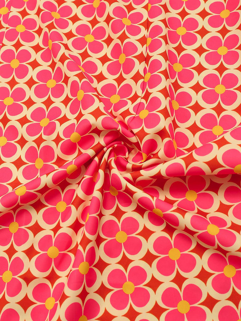 Robe orange imprimé fleurs contrastées boutonnée années 1960