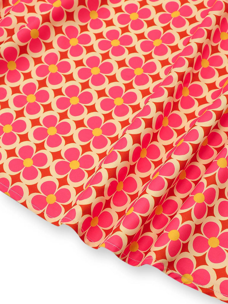 Robe orange imprimé fleurs contrastées boutonnée années 1960