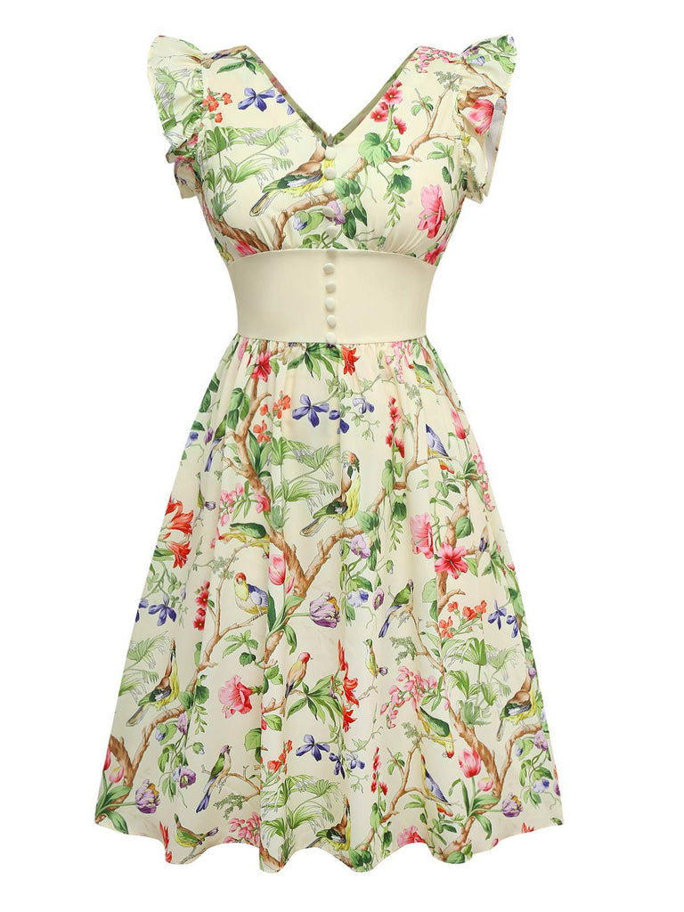 Robe jaune oiseaux et fleurs à volants années 1950