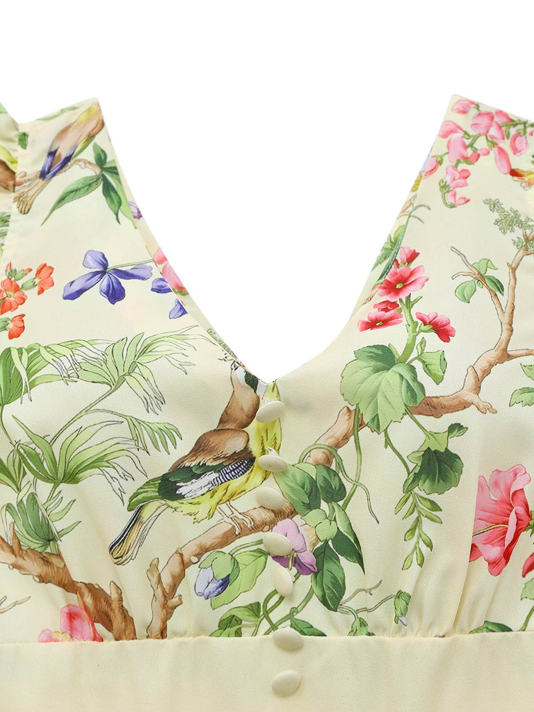 Robe jaune oiseaux et fleurs à volants années 1950