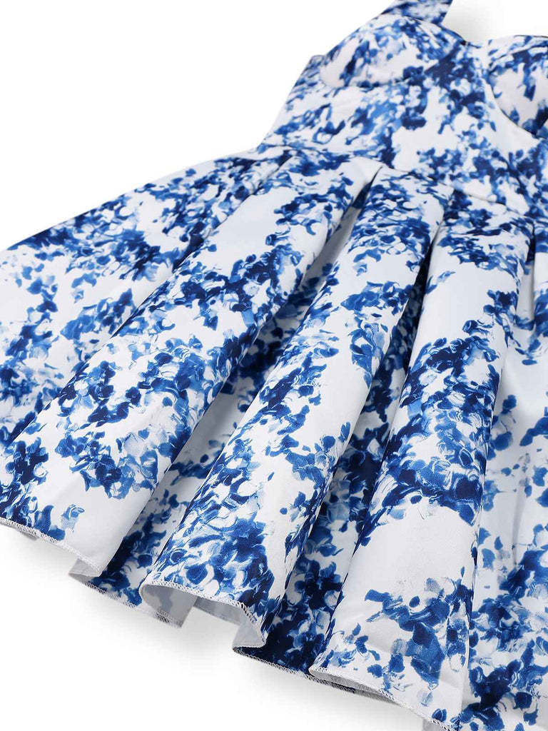 Robe patineuse bleue à fleurs et épaules nouées années 1960