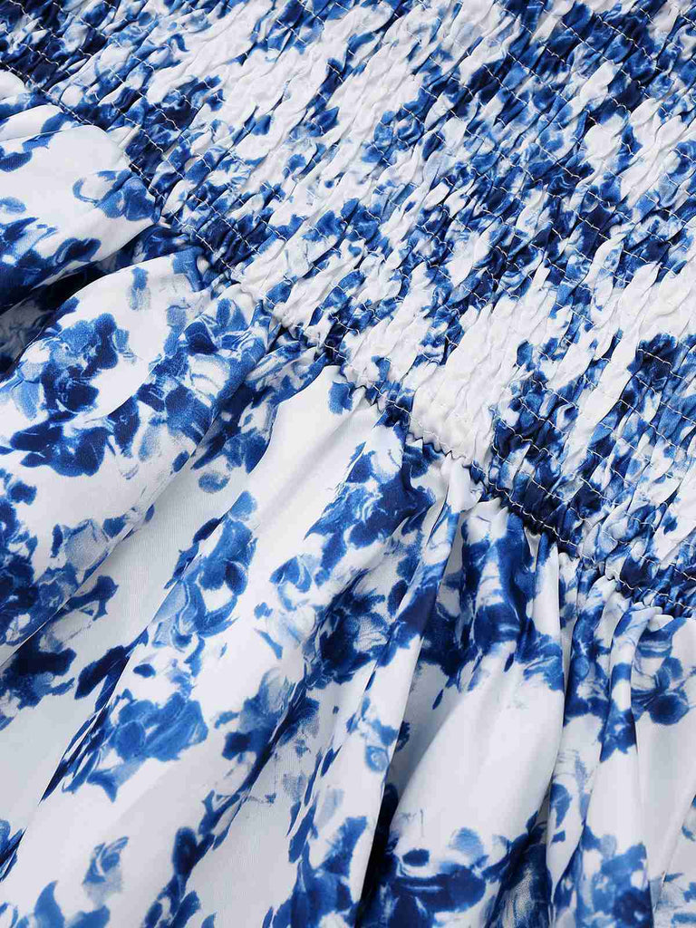 Robe patineuse bleue à fleurs et épaules nouées années 1960