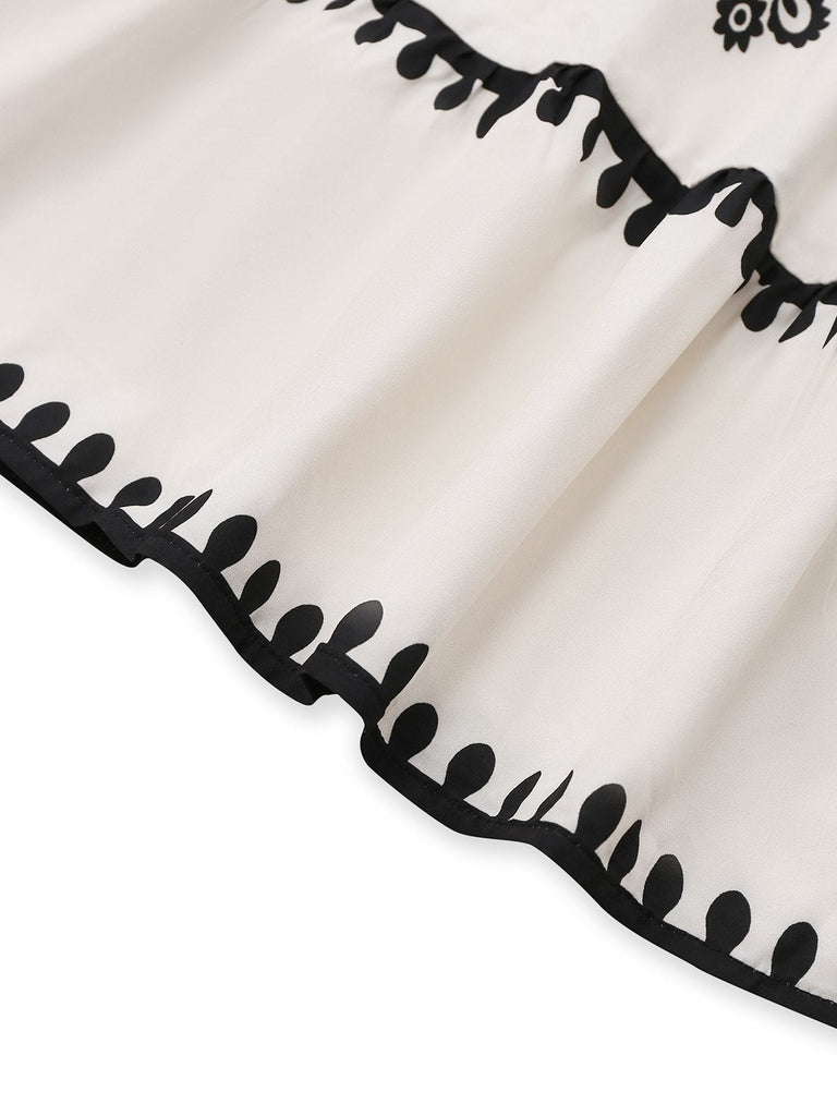 Robe blanche imprimés tribaux style bohème col en V profond années 1970