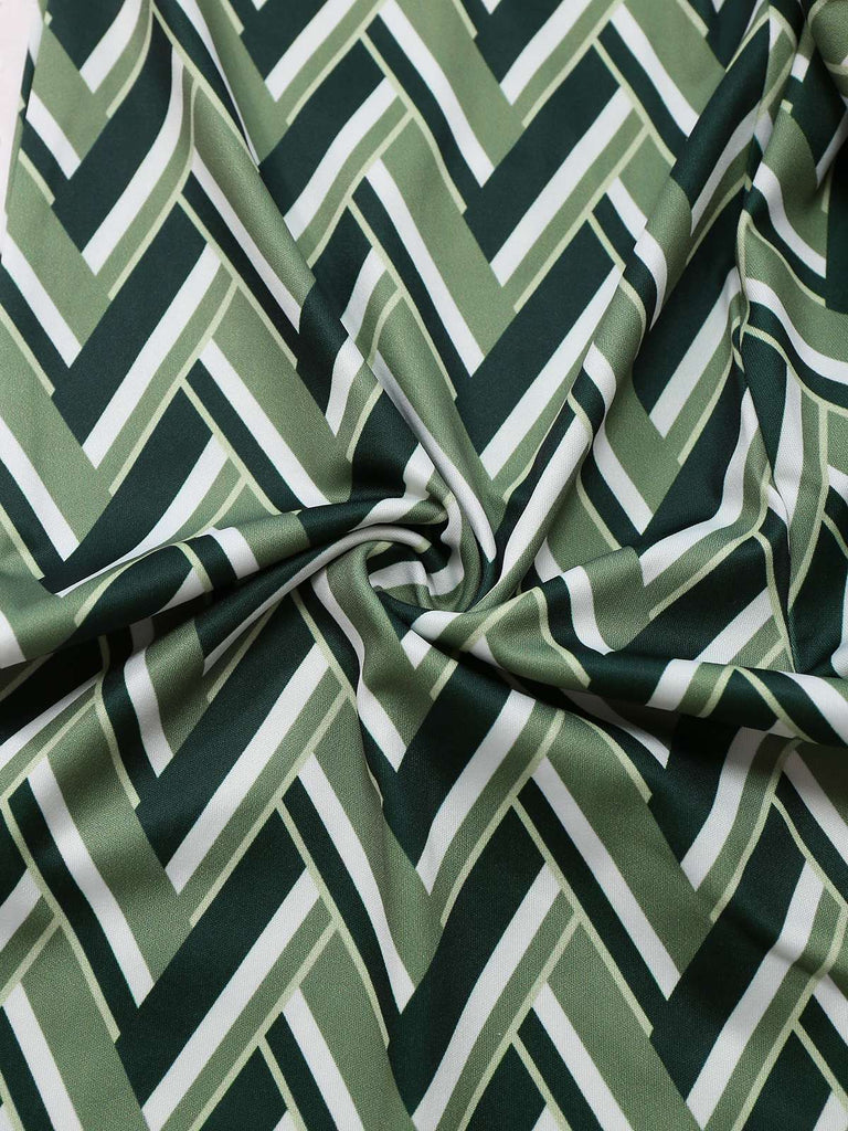 Combinaison pattes d'éléphant verte chevrons bohème col en V profond des années 1970