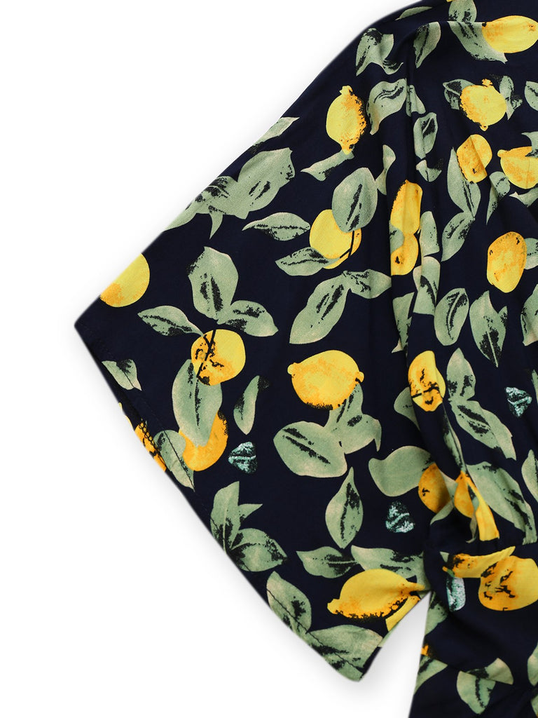 Robe en mousseline de soie jaune citron col V et smocks des années 1950