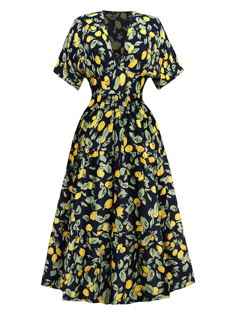 Robe en mousseline de soie jaune citron col V et smocks des années 1950