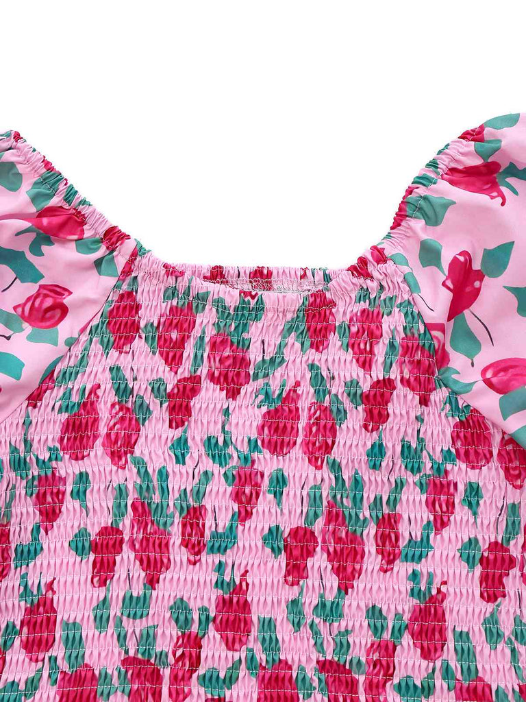 Combinaison rose à manches bouffantes années 1930