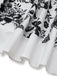 Robe chemise noire blanc à fleurs et ceinture des années 1940