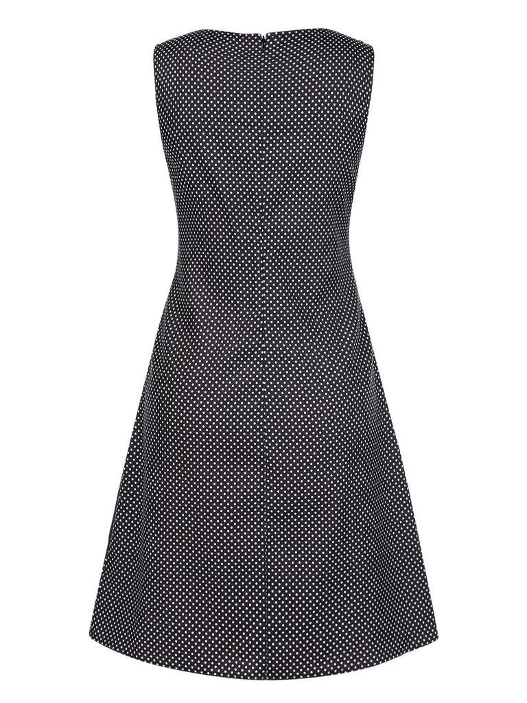 Robe noire à pois et imprimé visage années 1960