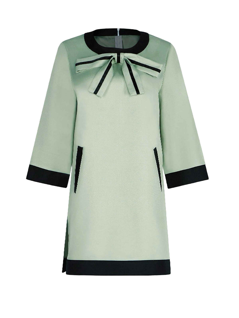 Robe trapèze verte à nœud inspirée de The Queen's Gambit des années 1970