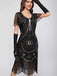 Robe à franges et paillettes à encolure dégagée des années 1920