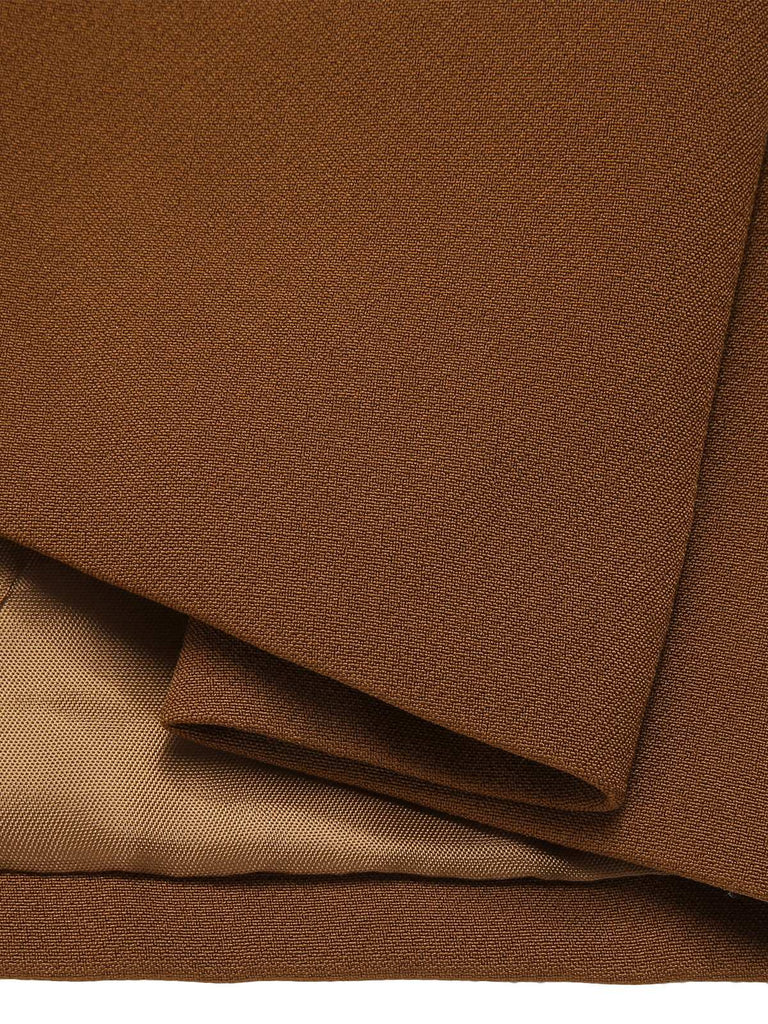 Manteau cape à revers couleur vert des années 1940