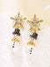 Boucles d'oreilles bonhomme de neige en strass flocons de neige et perles