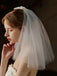 Voile de mariée blanc avec nœud vintage