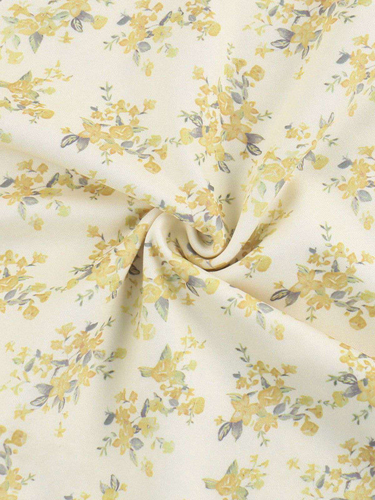 Robe jaune à fleurs et col en V manches bouffantes années 1960