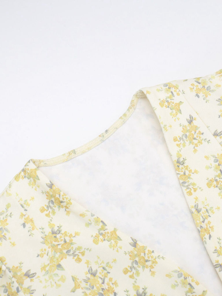 Robe jaune à fleurs et col en V manches bouffantes années 1960