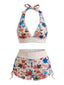 Ensemble de bikini blanc haut dos nu et bas shorty motif fleurs sauvages années 50