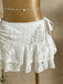 Ensemble bikini col halter et cache-maillot fleurie années 1960