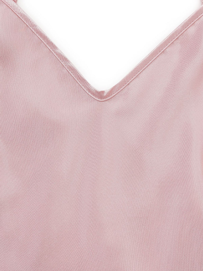 Close-up of a pink satin fabric with a V-neckline