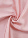 Close-up of pink fabric with a swirl pattern