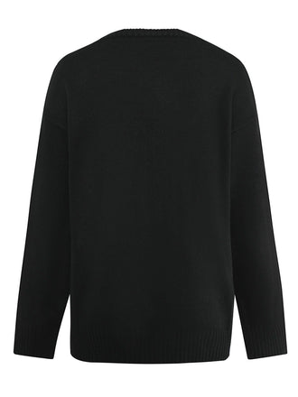 Pull en tricot noire à squelette Halloween années 1950