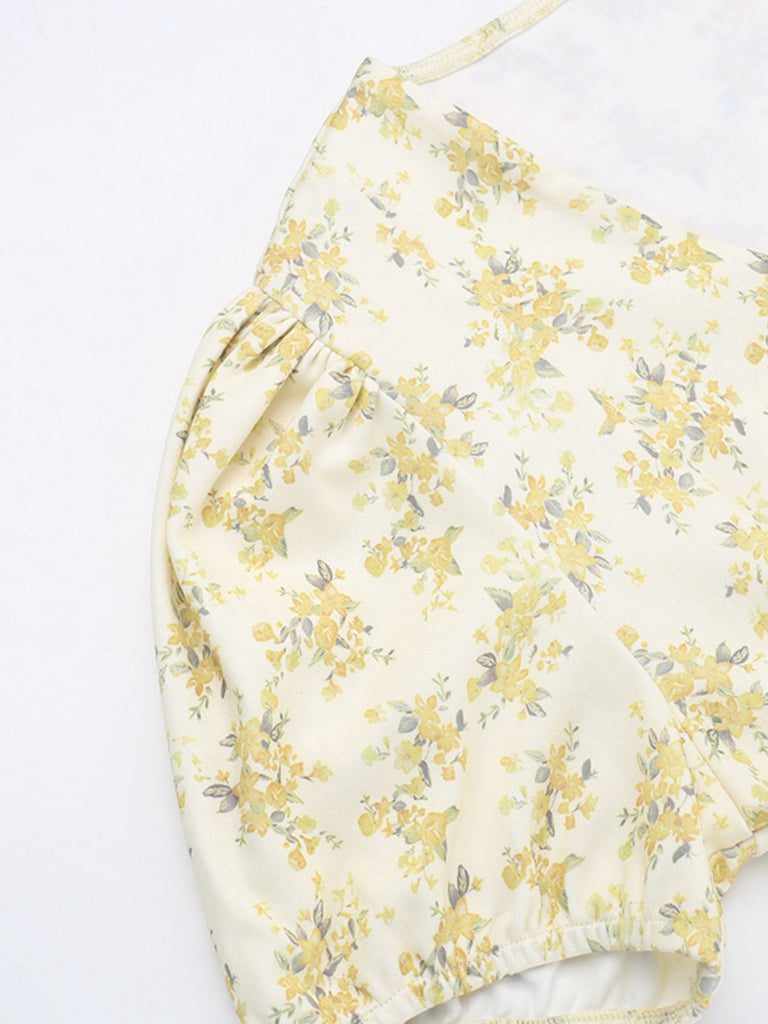 Robe jaune à fleurs et col en V manches bouffantes années 1960
