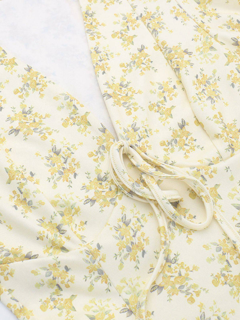 Robe jaune à fleurs et col en V manches bouffantes années 1960