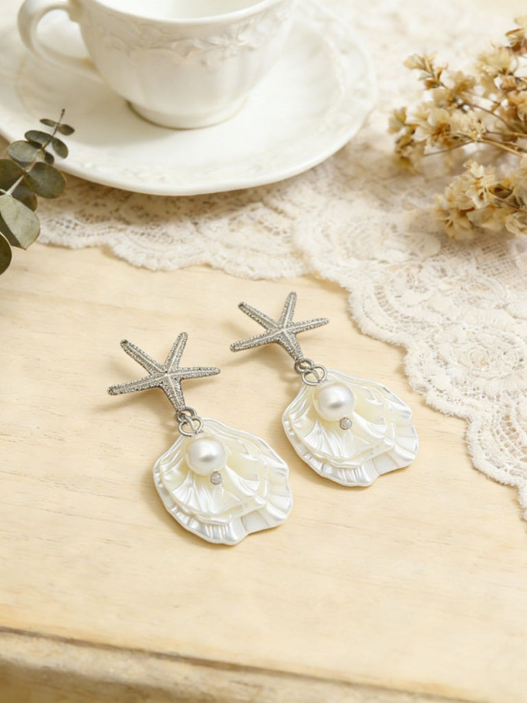 Boucles d'oreilles pendantes en coquillage d'étoile de mer doré perle