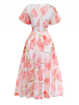 Robe longue rose à imprimé floral col en V et manches bouffantes années 1950