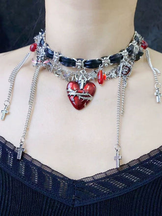 Collier ras-du-cou gothique en cuir avec croix et pompon
