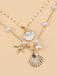 Collier superposé en coquillages perles et étoiles de mer