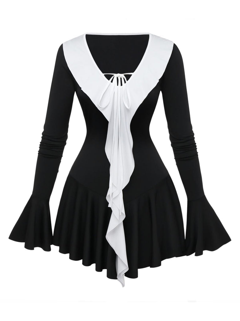 Robe péplum à volants noire et blanche années 1960