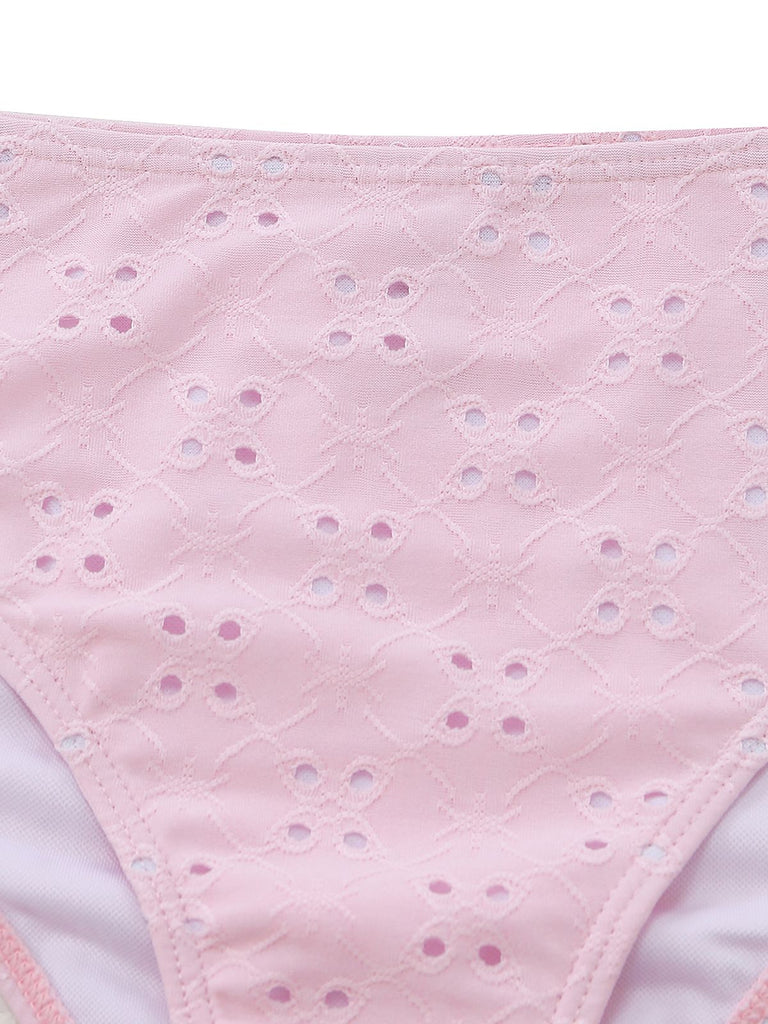 Pink textured fabric with a subtle pattern on a white background