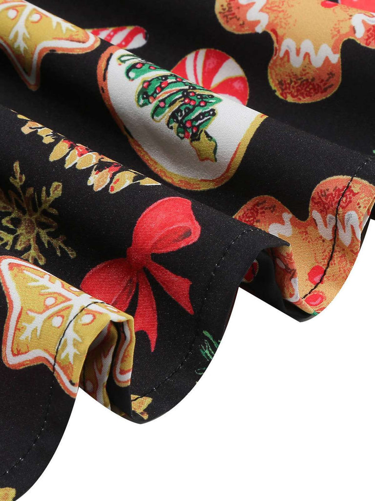 Robe noire de Noël motifs de pain d'épice et de cannes années 1950