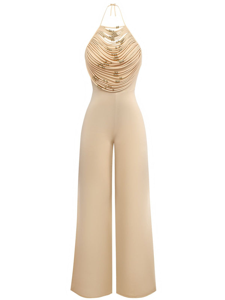 Combinaison beige à dos nu froncé et ornée perles jambes larges années 60