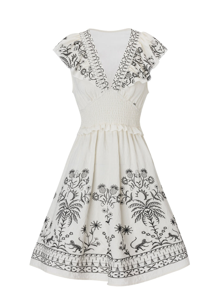 Robe col V à volants floraux blanc des années 1970