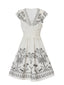 Robe col V à volants floraux blanc des années 1970