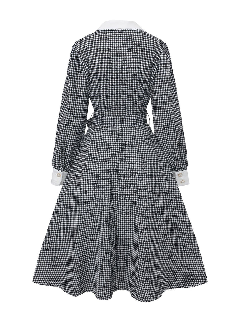 Robe noire à manches bouffantes et boutons nacrés style pied-de-poule années 1940